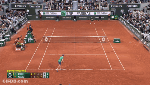 A Tennis Court With Emirates And Bnp Paribas Ads On The Side GIF