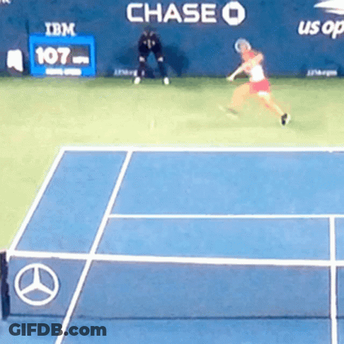 A Tennis Game Is Being Played In Front Of A Chase Banner GIF