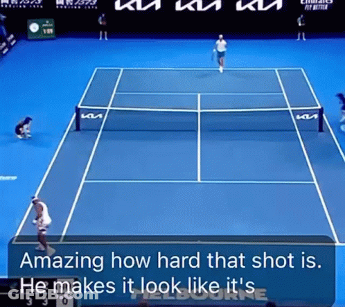 A Tennis Match Is Being Played On A Blue Court And The Words Amazing How Hard That Shot Is Are On The Screen GIF