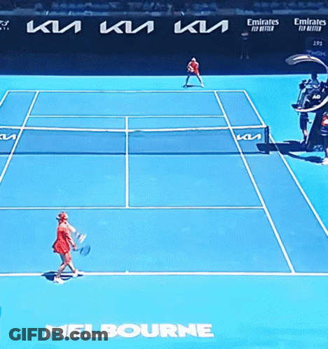 A Tennis Match Is Being Played On A Court Sponsored By Emirates Fly Better GIF