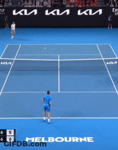 A Tennis Match Is Being Played On A Court That Says Melbourne On It GIF
