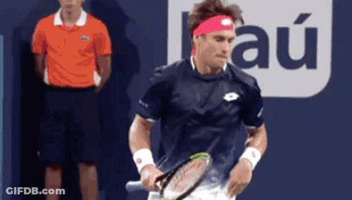 A Tennis Player In Front Of A Sign That Says " Au " GIF