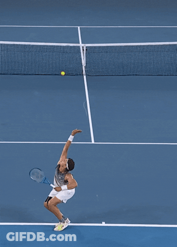 A Tennis Player Is About To Hit A Ball On A Court With A Ktm Logo On The Net GIF