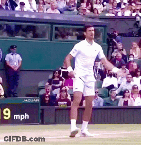 A Tennis Player On A Court With A Sign That Says 90 Mph In The Background GIF