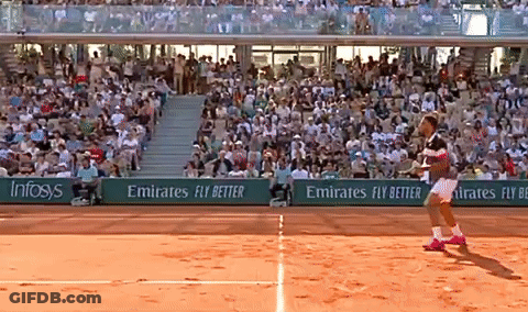 A Tennis Player On A Court With Emirates Fly Better Advertisements On The Sidelines GIF