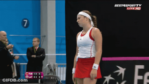 A Tennis Player Stands In Front Of A Sign That Says Best4sport Tv Live Hd GIF