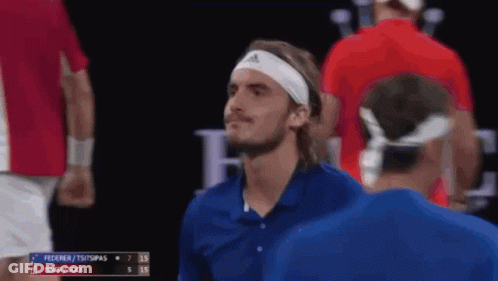 A Tennis Player Wearing A Headband With The Word Adidas On It Looks At The Camera GIF
