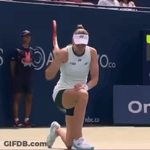 A Tennis Player Wearing A White Tank Top And A Visor With The Letters Yz On It GIF