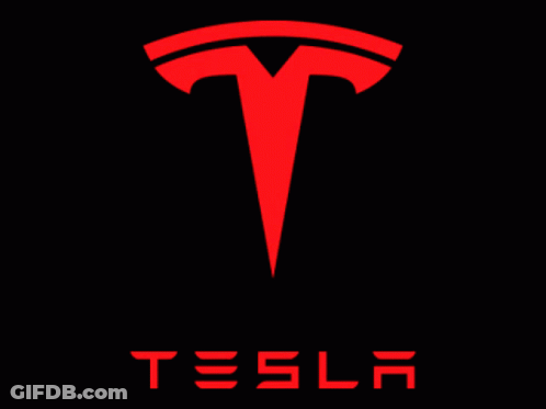 A Tesla Logo Is Surrounded By Red Lightning GIF