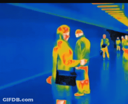 A Thermal Image Of A Man And A Woman GIF