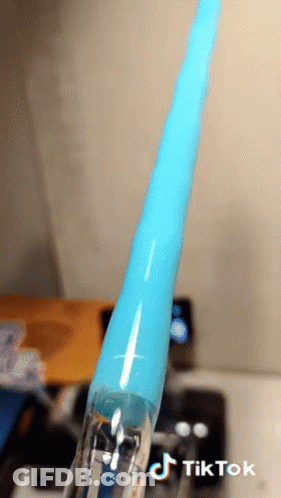 A Tiktok Video Of A Blue Toothbrush GIF