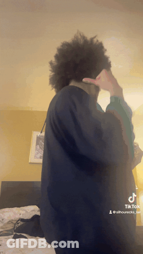 A Tiktok Video Of A Man Covering His Face GIF