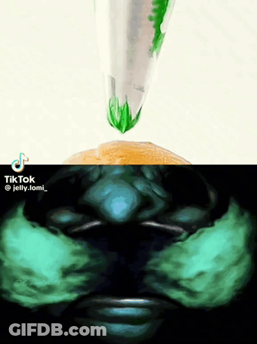 A Tiktok Video Of A Person 'S Face With Jelly Coming Out Of A Cone GIF
