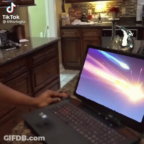 A Tiktok Video Of A Person Using A Laptop With A Shooting Star On The Screen GIF