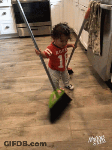 A Toddler Wearing A Red Shirt With The Number 10 On It GIF