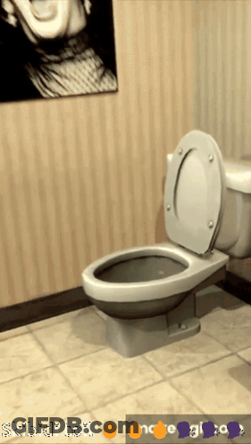 A Toilet Sits In A Bathroom With A Screen That Says Skibidi Bot GIF