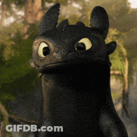 A Toothless From How To Train Your Dragon Is Looking At The Camera GIF