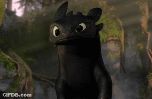 A Toothless From How To Train Your Dragon Is Smiling GIF