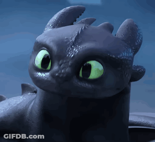 A Toothless From How To Train Your Dragon With Green Eyes GIF