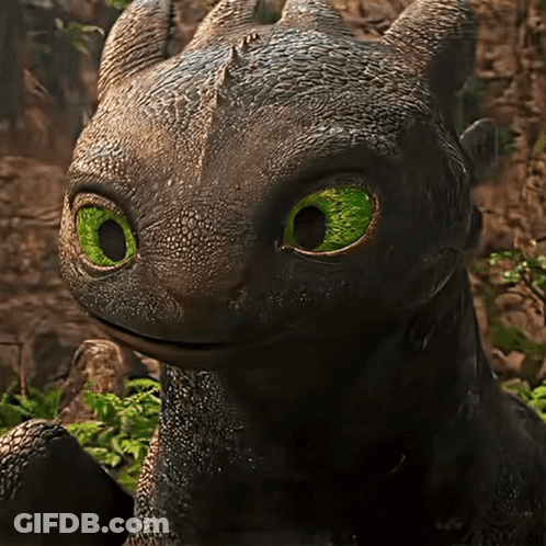 A Toothless From How To Train Your Dragon With Green Eyes GIF