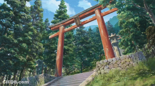 A Torii Gate In A Forest With Stairs Leading Up To It GIF