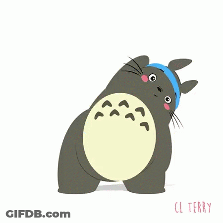 A Totoro From My Neighbor Totoro Is Wearing A Blue Headband And Doing Exercises . GIF