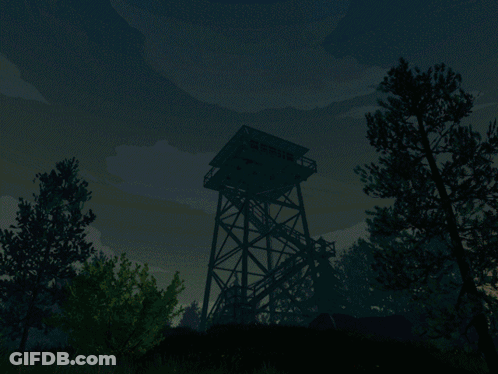 A Tower In The Middle Of A Field With A Blue Sky In The Background GIF