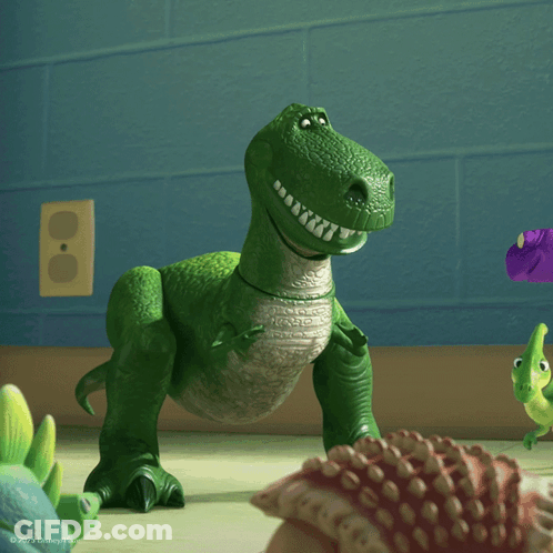 A Toy Dinosaur From The Movie Toy Story Is Smiling GIF
