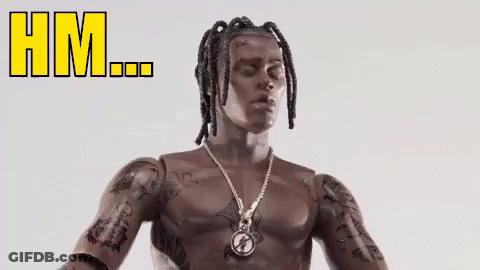 A Toy Figure Of A Man Wearing A Necklace And Dreadlocks . GIF