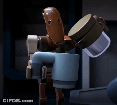 A Toy Robot Is Holding A Cup Of Coffee In Its Hand GIF