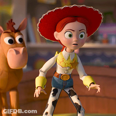 A Toy Story Character Is Standing Next To A Stuffed Animal GIF
