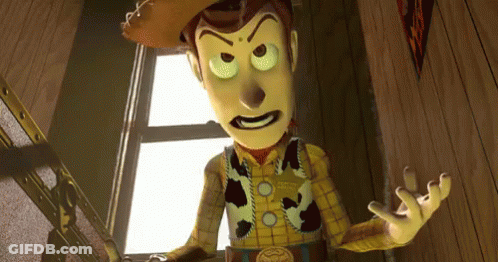 A Toy Story Character With A Cowboy Hat On GIF