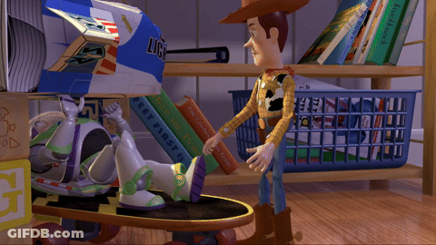 A Toy Story Scene With Woody And Buzz Lightyear Playing GIF