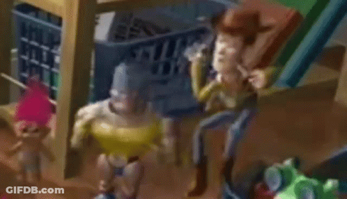 A Toy Story Scene With Woody , Buzz Lightyear , And Trolls . GIF