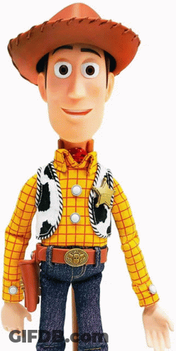 A Toy Story Woody Doll With A Cowboy Hat GIF
