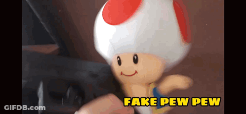 A Toy Toad With Fake Pew Pew Written On The Bottom Right GIF