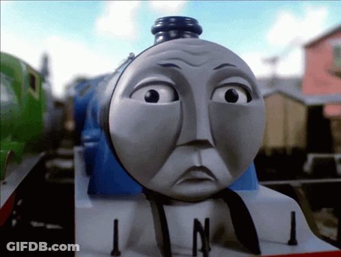A Toy Train With A Sad Look On Its Face And The Number 1 On The Front GIF