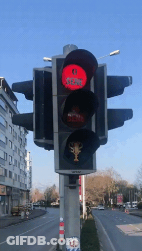 A Traffic Light With A Red Light That Says Sema On It GIF
