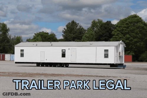 A Trailer Park Legal Sign With A Mobile Home GIF