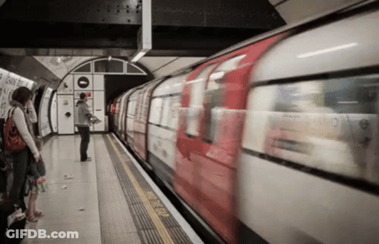 A Train Going Through A Tunnel GIF