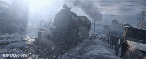 A Train Is Going Through A Snowy Landscape With A Sign That Says ' A ' On It GIF