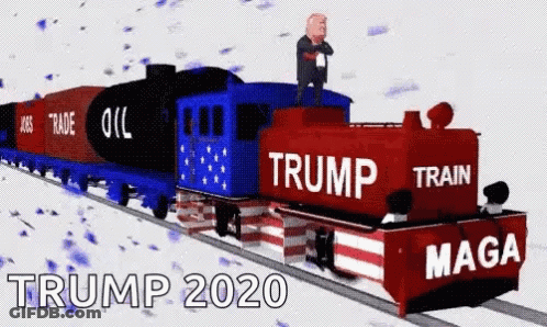 A Train That Says Trump Train Maga On The Side Of It GIF