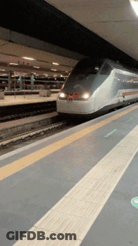 A Train With A Red Circle On The Front Of It GIF