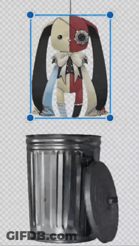 A Trash Can With A Picture Of A Doll On It GIF