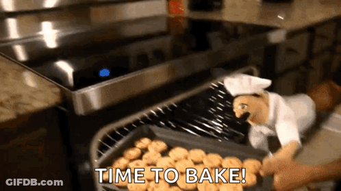 A Tray Of Cookies In An Oven With The Words Time To Bake GIF
