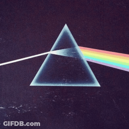 A Triangle With A Rainbow Coming Out Of It On A Dark Background GIF