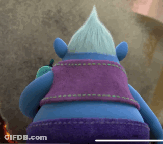 A Troll With A Purple Vest And Purple Shorts GIF