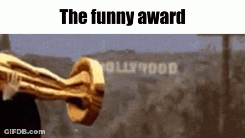 A Trophy Is Being Held In Front Of A Sign That Says Hollywood GIF