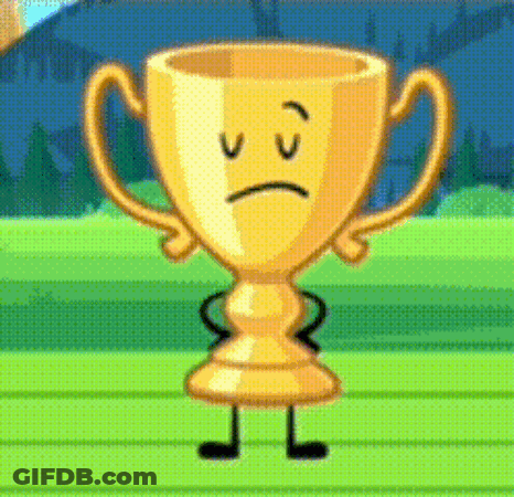A Trophy With A Sad Face And Arms And Legs Is Standing On A Wooden Table . GIF