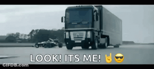 A Truck Is Driving Down A Road With The Words Look It 'S Me Written On The Bottom GIF